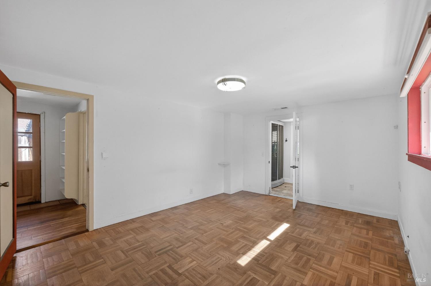 1450 Timberhill Road Santa Rosa, CA 95401 - Photo 27 of 50 a view of a big room with closet and wooden floor
