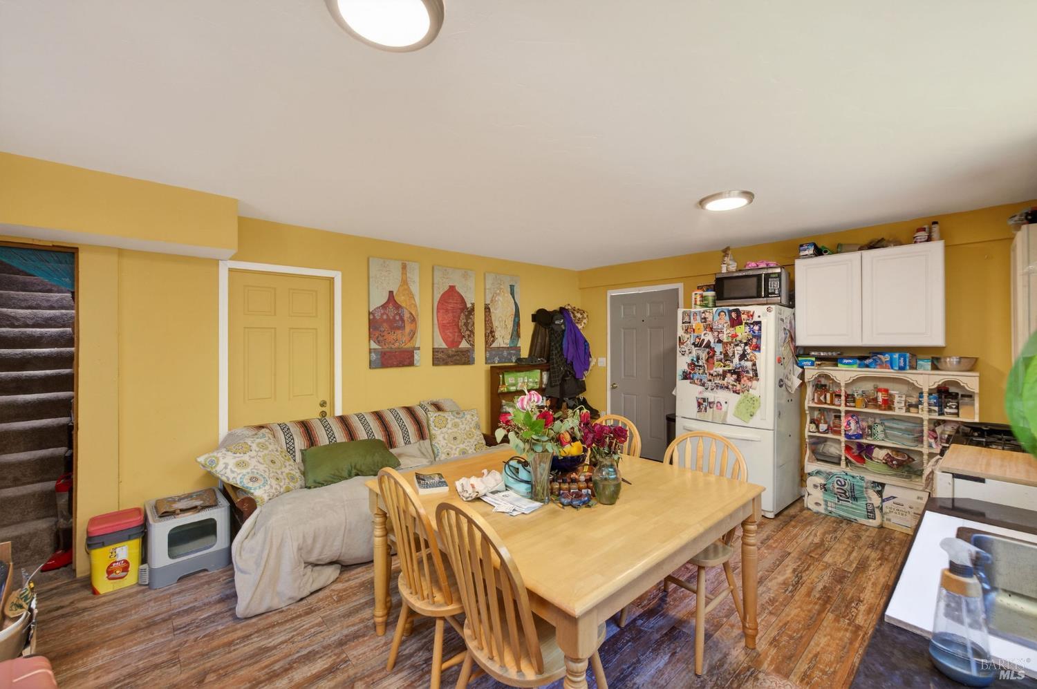 1450 Timberhill Road Santa Rosa, CA 95401 - Photo 35 of 50 a view of a dining room with furniture and wooden floor