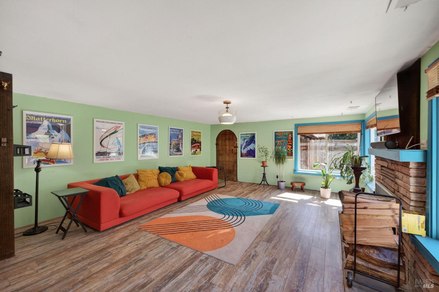 1450 Timberhill Road Santa Rosa, CA 95401 - Photo 6 of 50 a living room with fireplace furniture and a flat screen tv