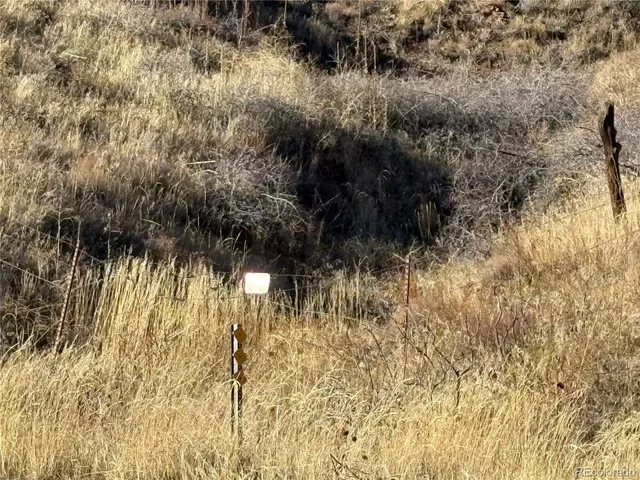 a view of swimming pool next to a yard