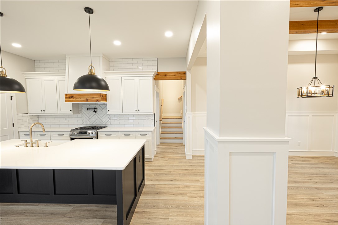 110 Hart Road Anderson, SC 29621 - Photo 20 of 31 Modern kitchen with an inviting layout and elegant light fixtures.