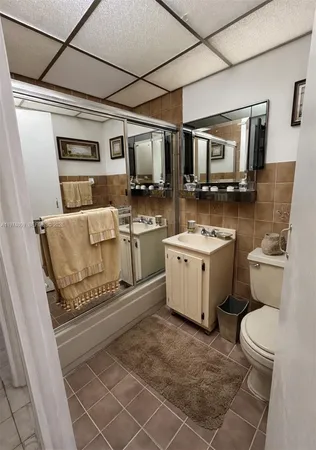 a bedroom with a bed and a cabinets