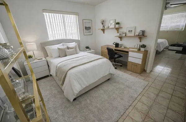a bathroom with a granite countertop sink a toilet and a shower