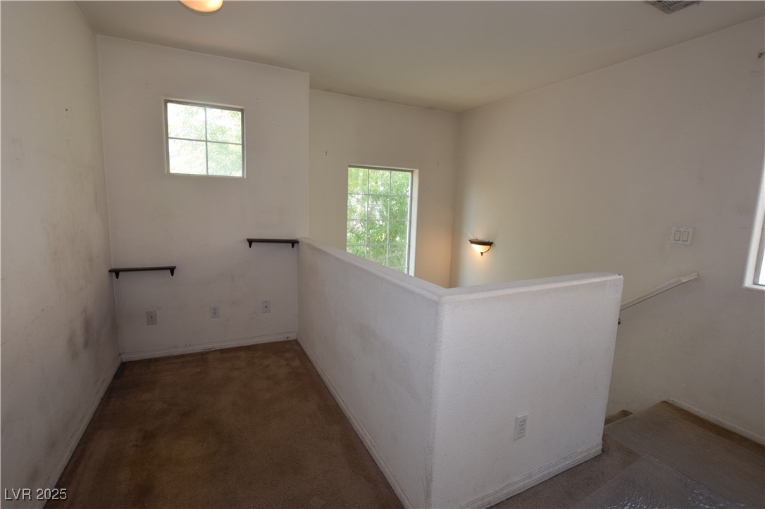 7322 Phlox Road Las Vegas, NV 89113 - Photo 23 of 47 desk area at top of landing