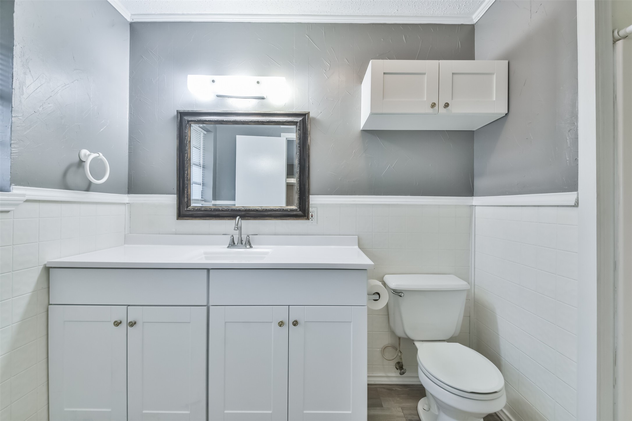 23807 Red Oak Drive Spring, TX 77389 - Photo 14 of 26 a bathroom with a toilet sink and mirror