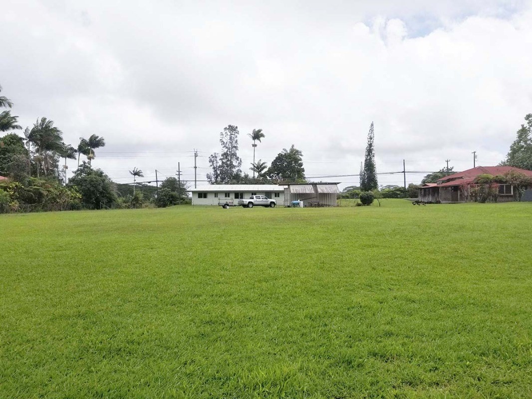 17-1080 Old Volcano Road Mountain View, HI 96771 - Photo 11 of 29 a view of a lake with houses in the back