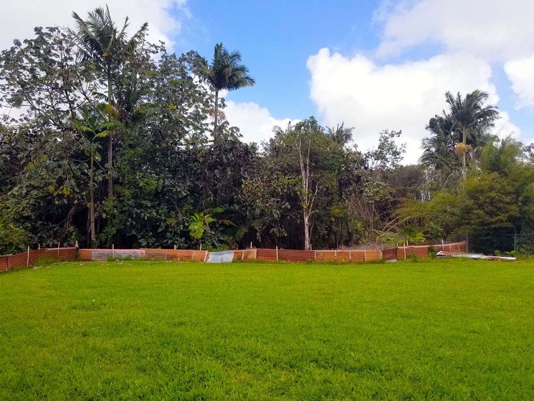 17-1080 Old Volcano Road Mountain View, HI 96771 - Photo 12 of 29 a view of a field of grass and trees