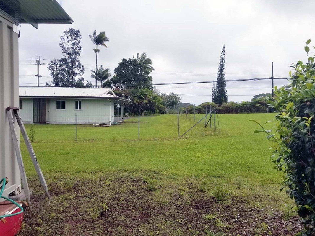 17-1080 Old Volcano Road Mountain View, HI 96771 - Photo 8 of 29 a view of a house with a backyard