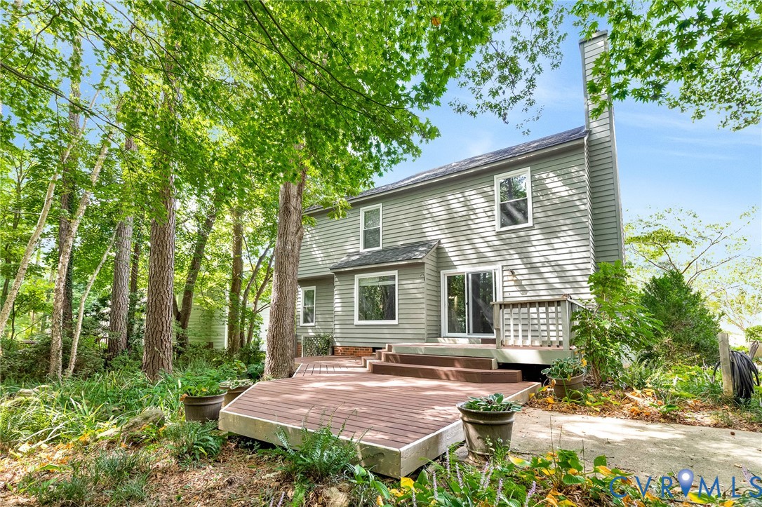 8703 Ewes Court Chesterfield, VA 23236 - Photo 27 of 31 a view of a house with backyard and sitting area