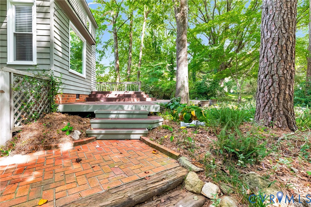 8703 Ewes Court Chesterfield, VA 23236 - Photo 28 of 31 a view of a backyard with sitting area