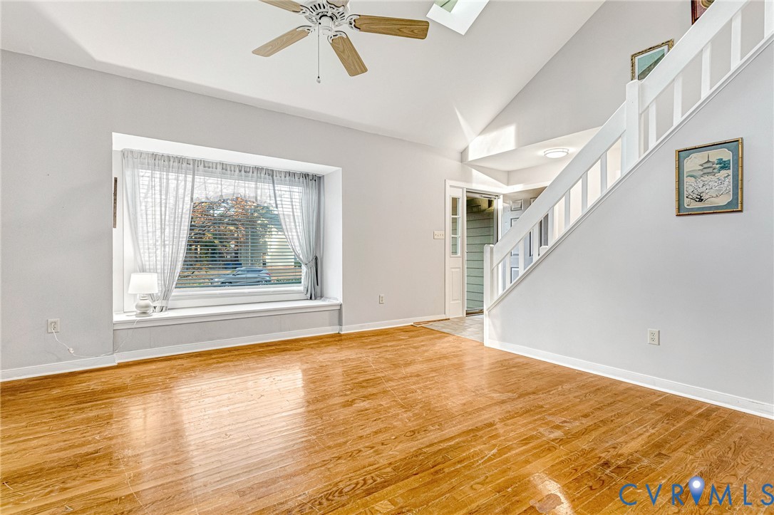 8703 Ewes Court Chesterfield, VA 23236 - Photo 7 of 31 a view of an empty room with wooden floor and a window