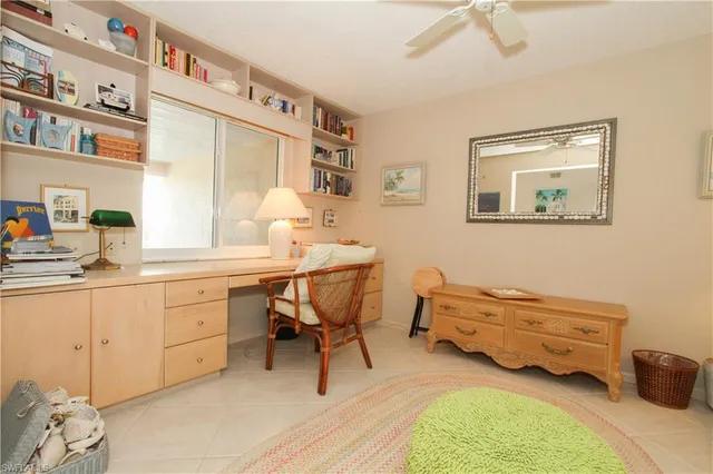 a bedroom with furniture and a wooden floor