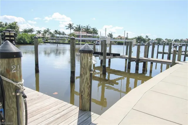 a view of a balcony with an outdoor seating