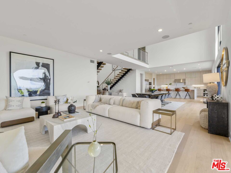 20416 Albion Way Porter Ranch, CA 91326 - Photo 15 of 38 a living room with furniture and a table