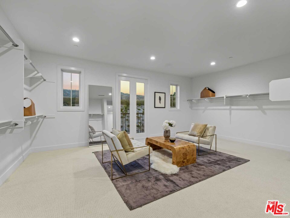 20416 Albion Way Porter Ranch, CA 91326 - Photo 22 of 38 a living room with furniture and a couch