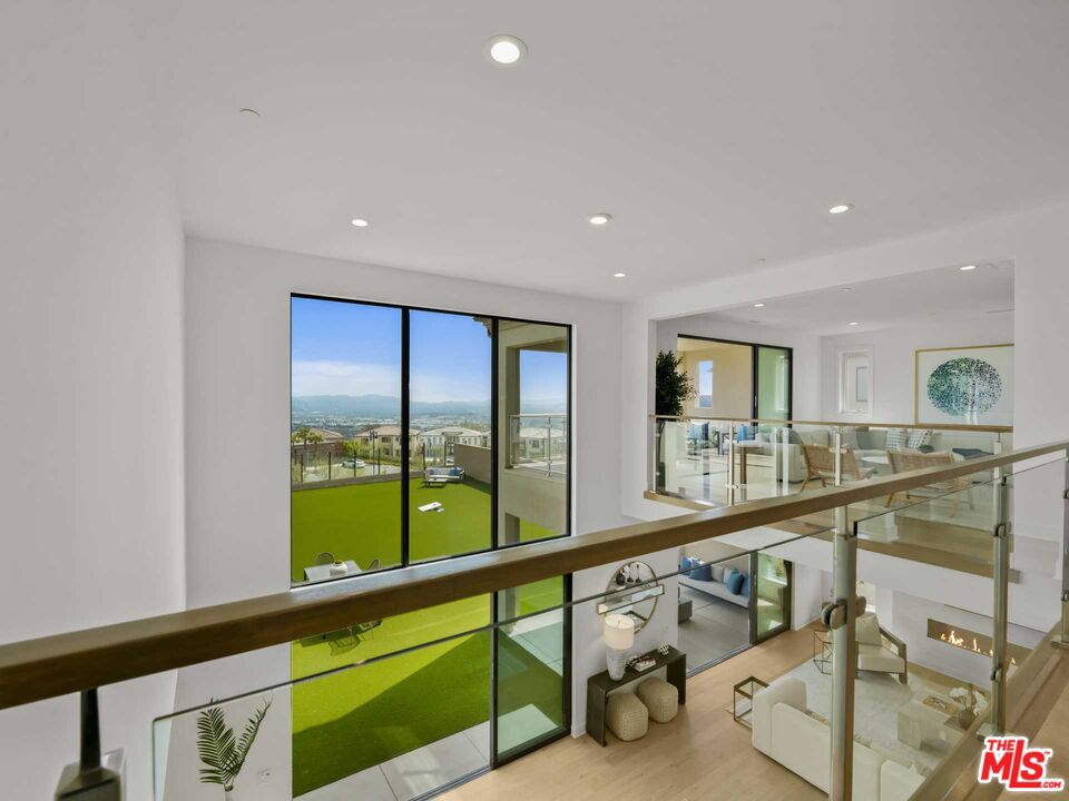 20416 Albion Way Porter Ranch, CA 91326 - Photo 24 of 38 a view of a living room and a large window