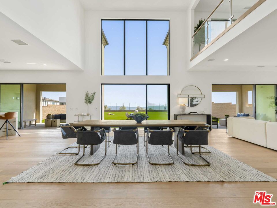 20416 Albion Way Porter Ranch, CA 91326 - Photo 3 of 38 a living room with furniture a rug and white walls