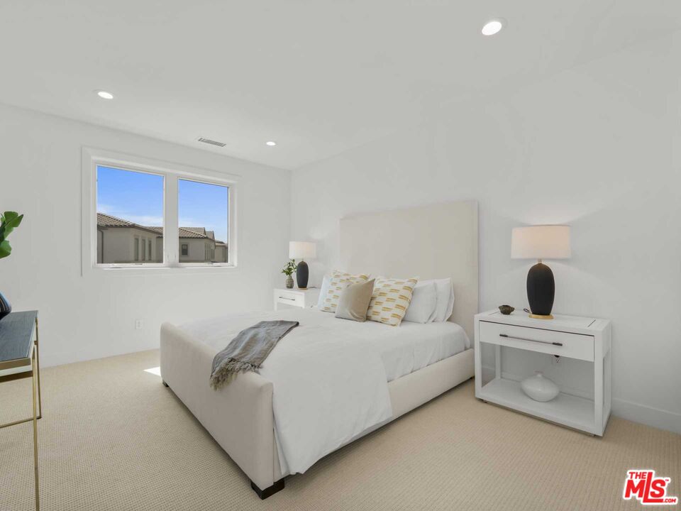 20416 Albion Way Porter Ranch, CA 91326 - Photo 32 of 38 a room with a bed and furniture