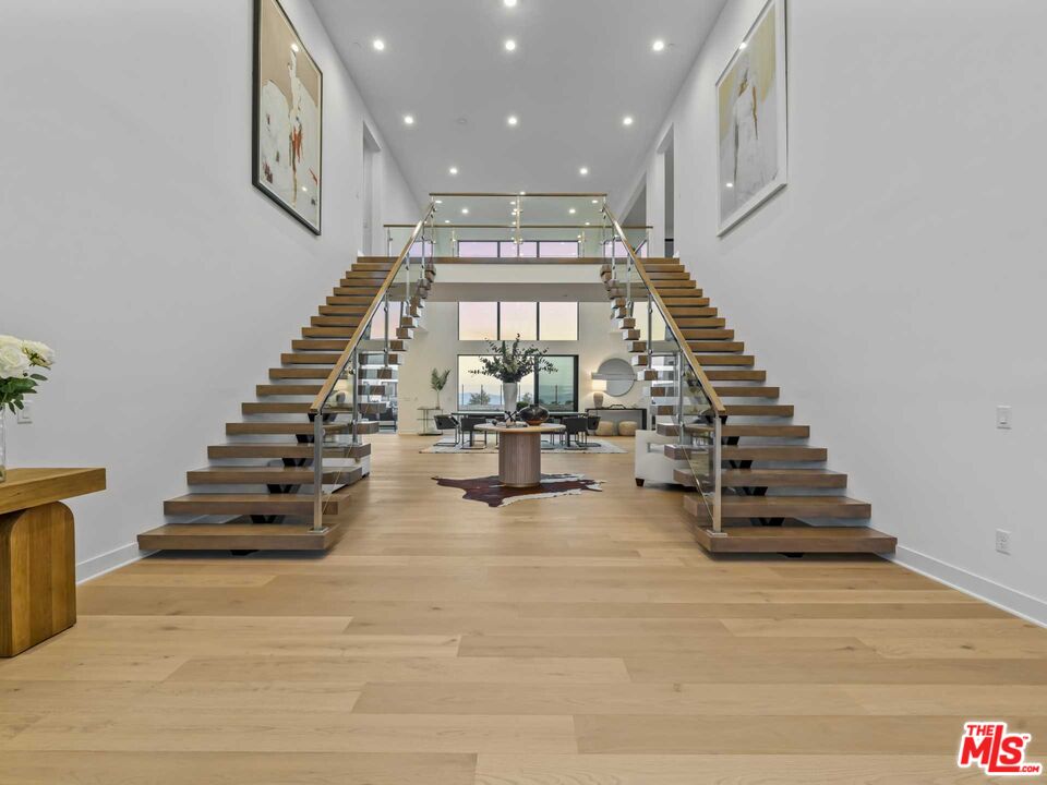 20416 Albion Way Porter Ranch, CA 91326 - Photo 5 of 38 a view of entryway and hall with wooden floor