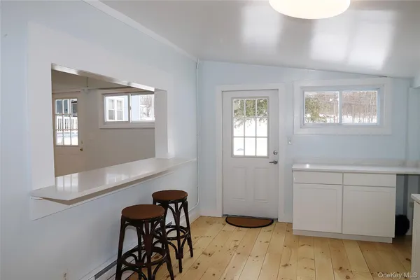 a bedroom with a bed and a table