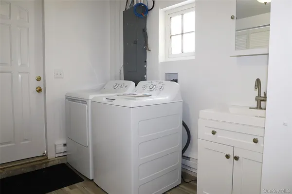 a bathroom with a sink toilet and vanity