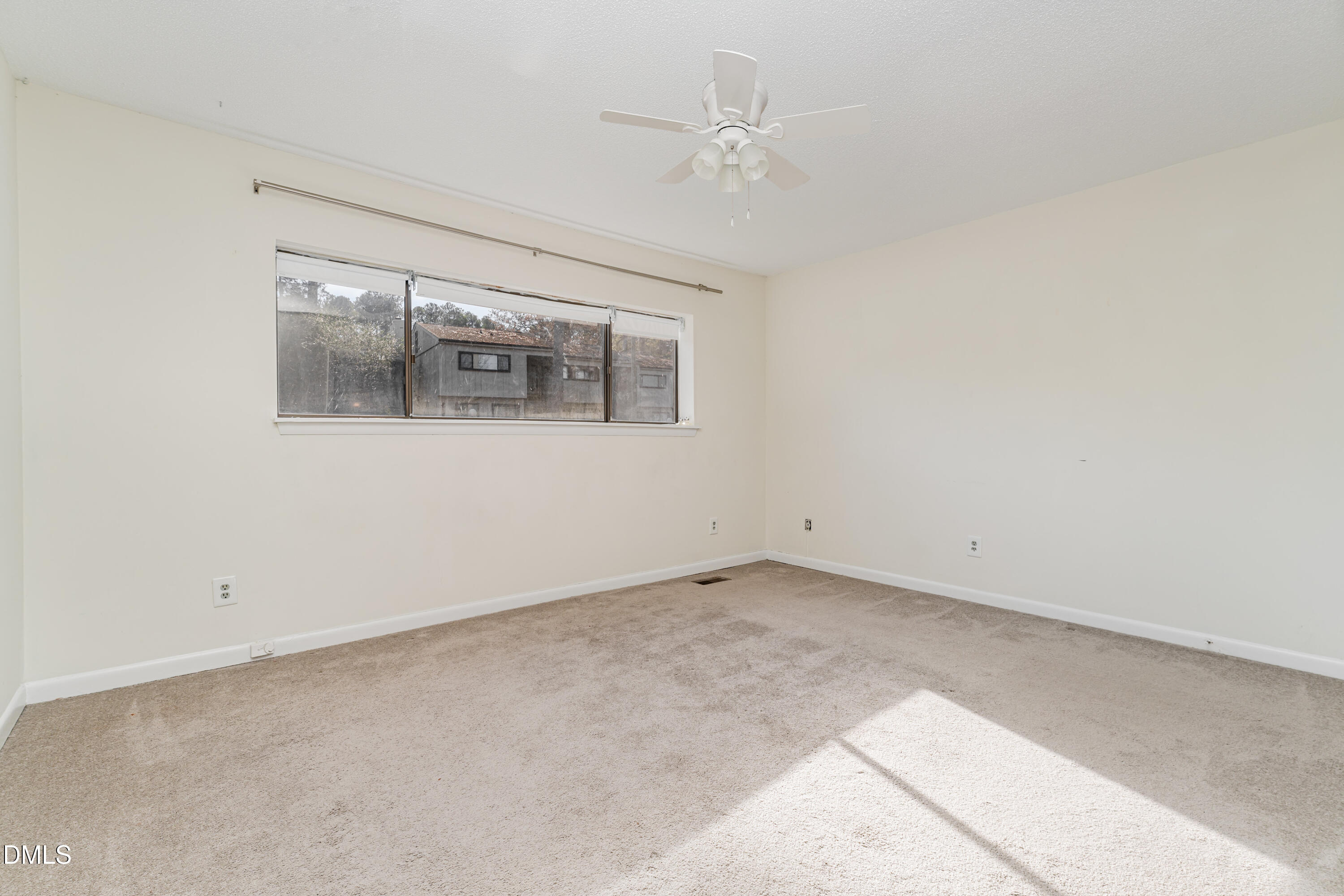 5073 Tall Pines Court Raleigh, NC 27609 - Photo 21 of 32 an empty room with a view of a bathroom