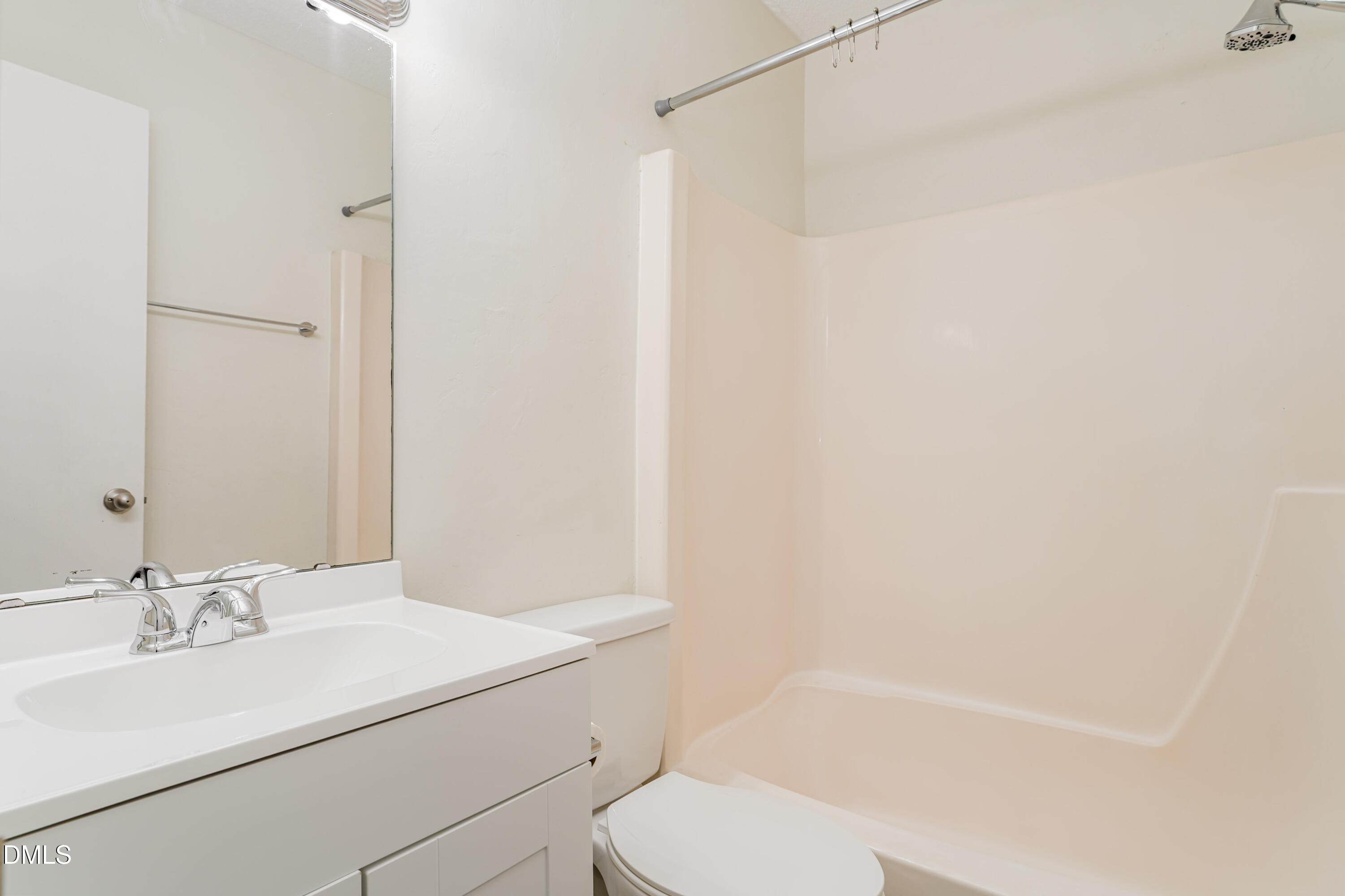 5073 Tall Pines Court Raleigh, NC 27609 - Photo 26 of 32 a bathroom with a sink toilet and shower