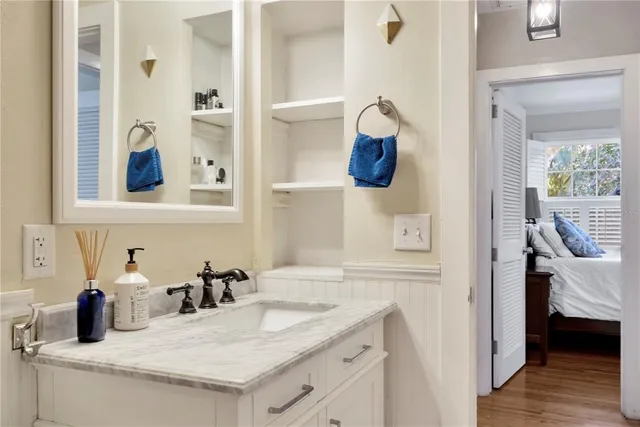 a room with a washer and dryer next to a window