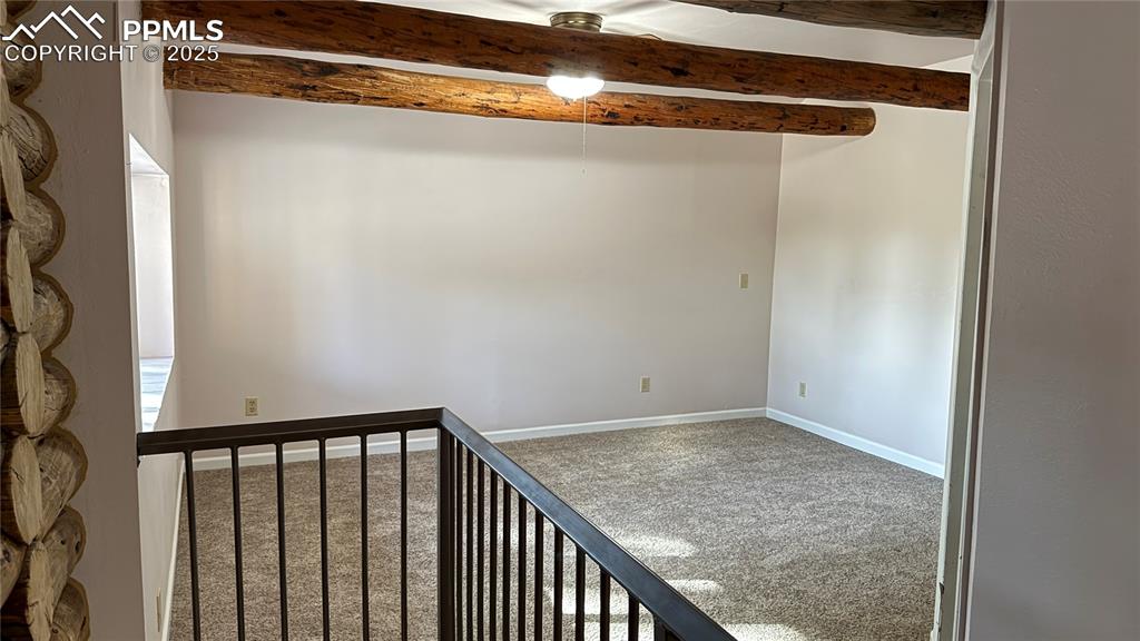 3250 Slocum Road Peyton, CO 80831 - Photo 13 of 50 a view of a room with racks on the wall