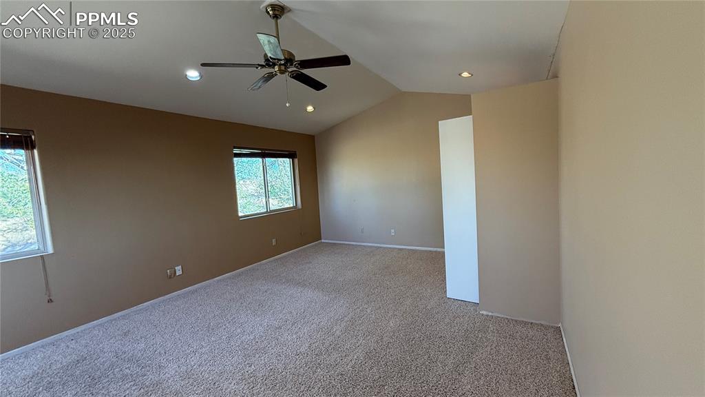 3250 Slocum Road Peyton, CO 80831 - Photo 31 of 50 a view of a livingroom with a ceiling fan and window