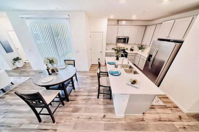 a living room with furniture and a table