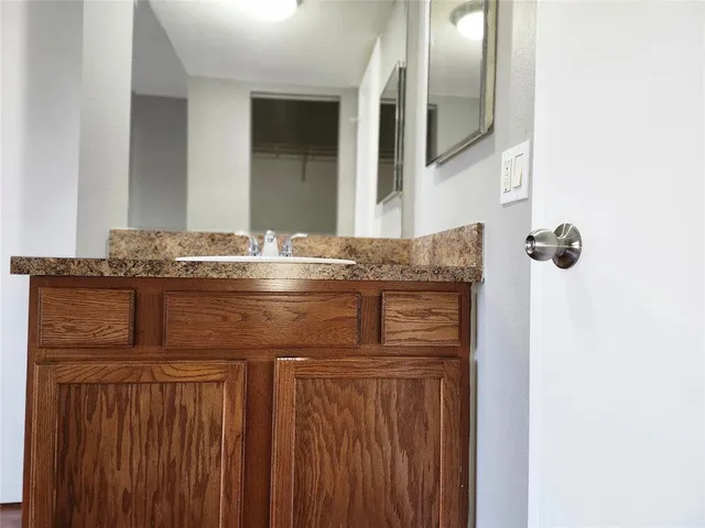 a bathroom with a toilet and a bathtub