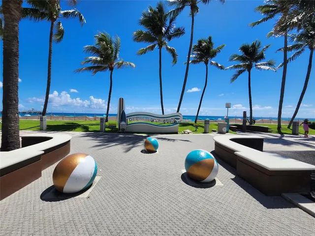 a living room with dryer and washer