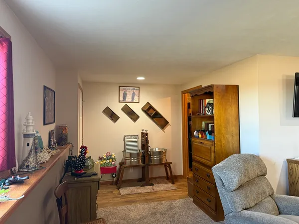 a bathroom with a sink mirror and toilet