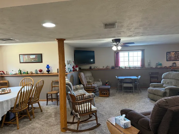 a house with swimming pool in front of it