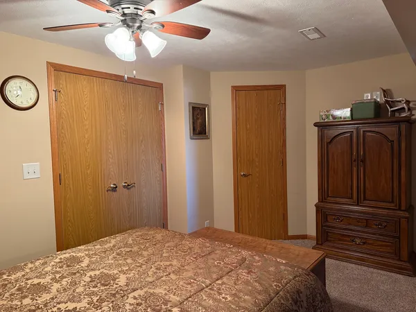 a large house with a large tree in front of it