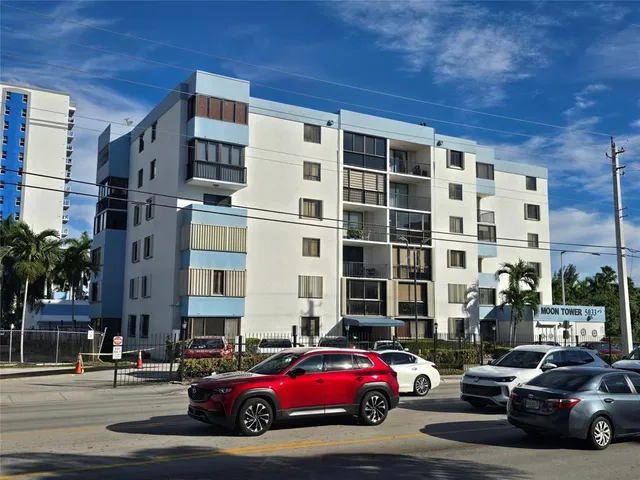 a cars parked in front of a building