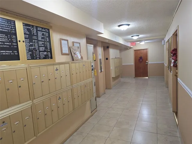 en empty room with sliding glass door and glass door
