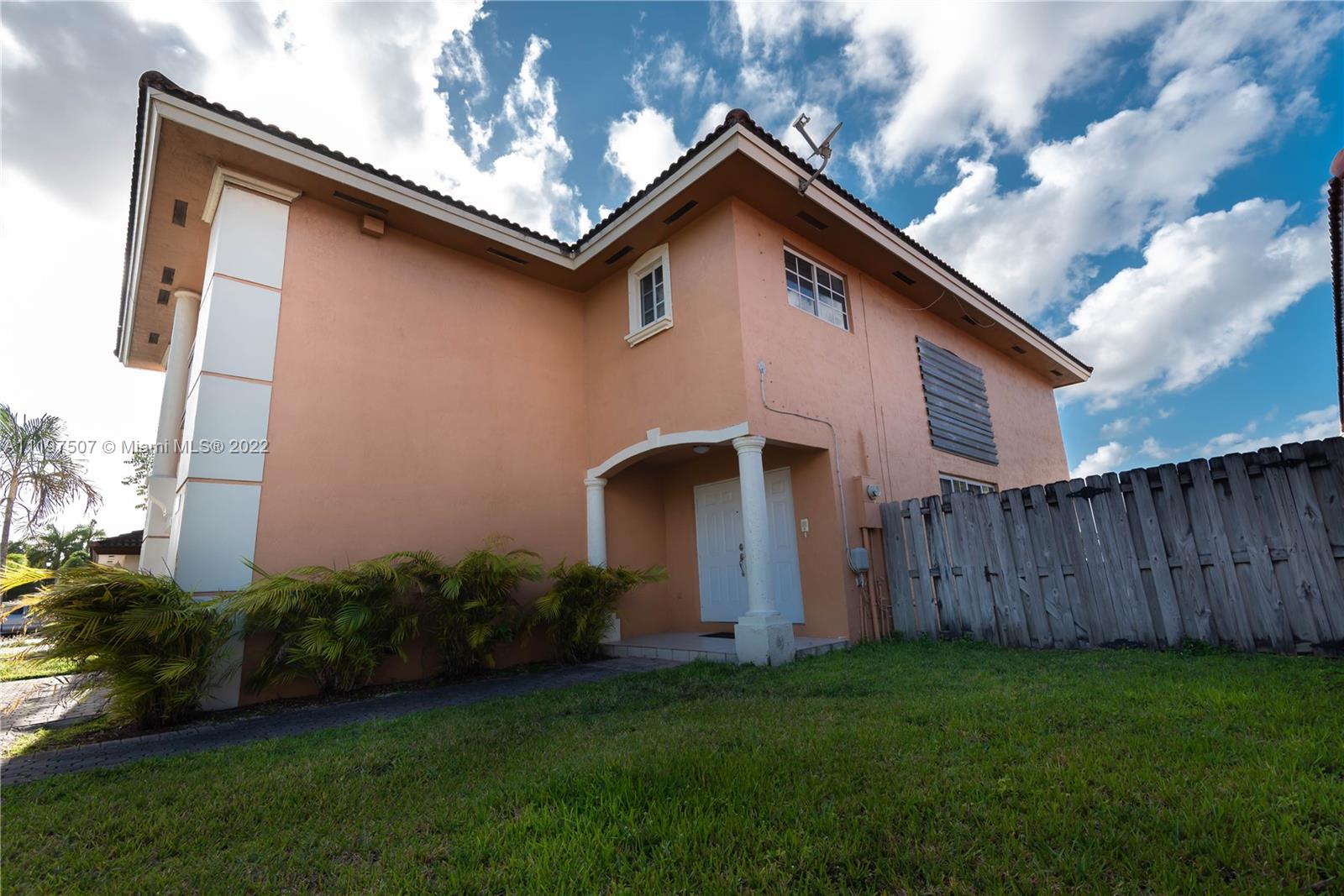 15341 Southwest 36th Street Miami, FL 33185 - Photo 3 of 3 a front view of house with a garden