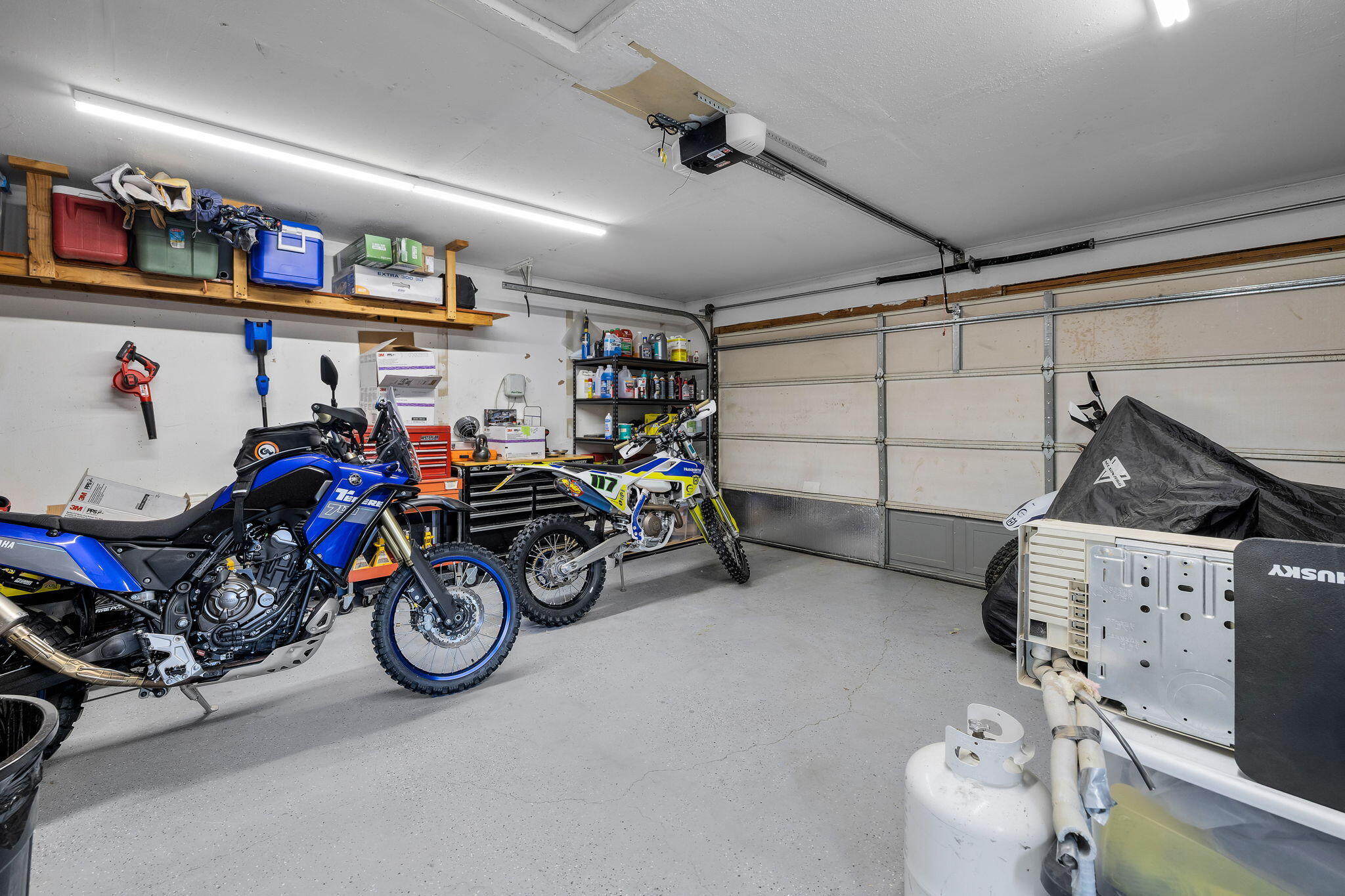 1255 Southwest 28th Street Redmond, OR 97756 - Photo 19 of 40 a view of a storage with a bike and car