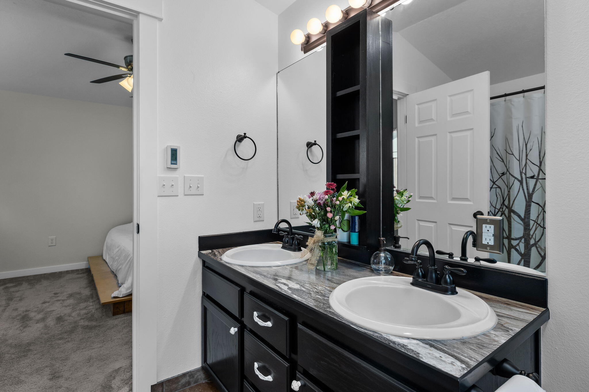 1255 Southwest 28th Street Redmond, OR 97756 - Photo 23 of 40 a bathroom with a sink and a mirror