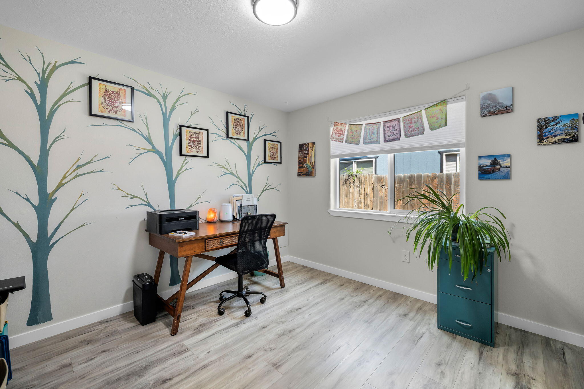 1255 Southwest 28th Street Redmond, OR 97756 - Photo 28 of 40 a workspace with furniture window and wooden floor