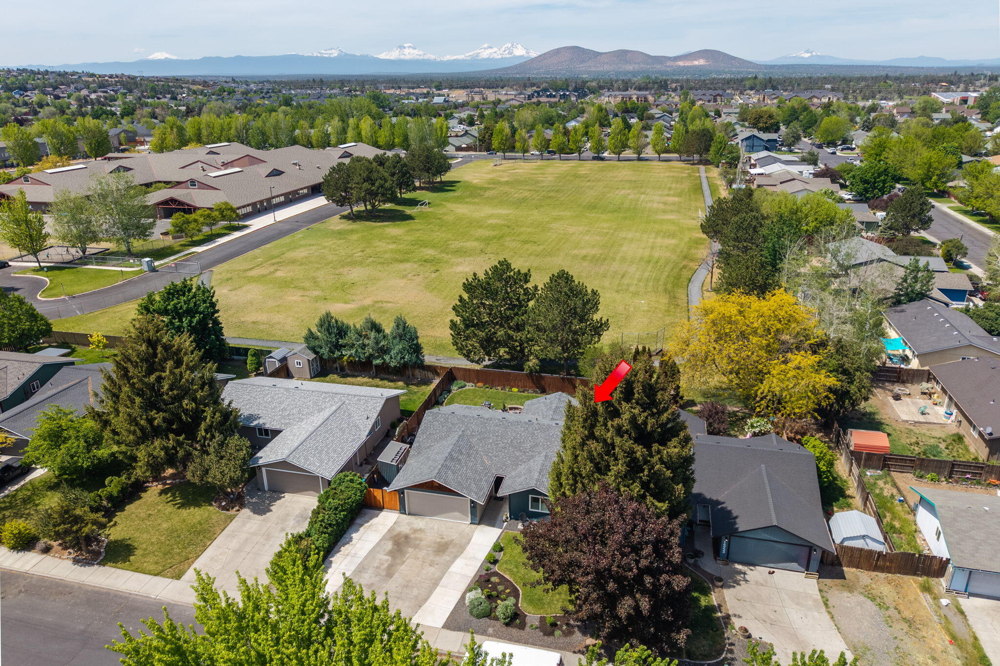1255 Southwest 28th Street Redmond, OR 97756 - Photo 37 of 40 an aerial view of residential house with outdoor space and lake view