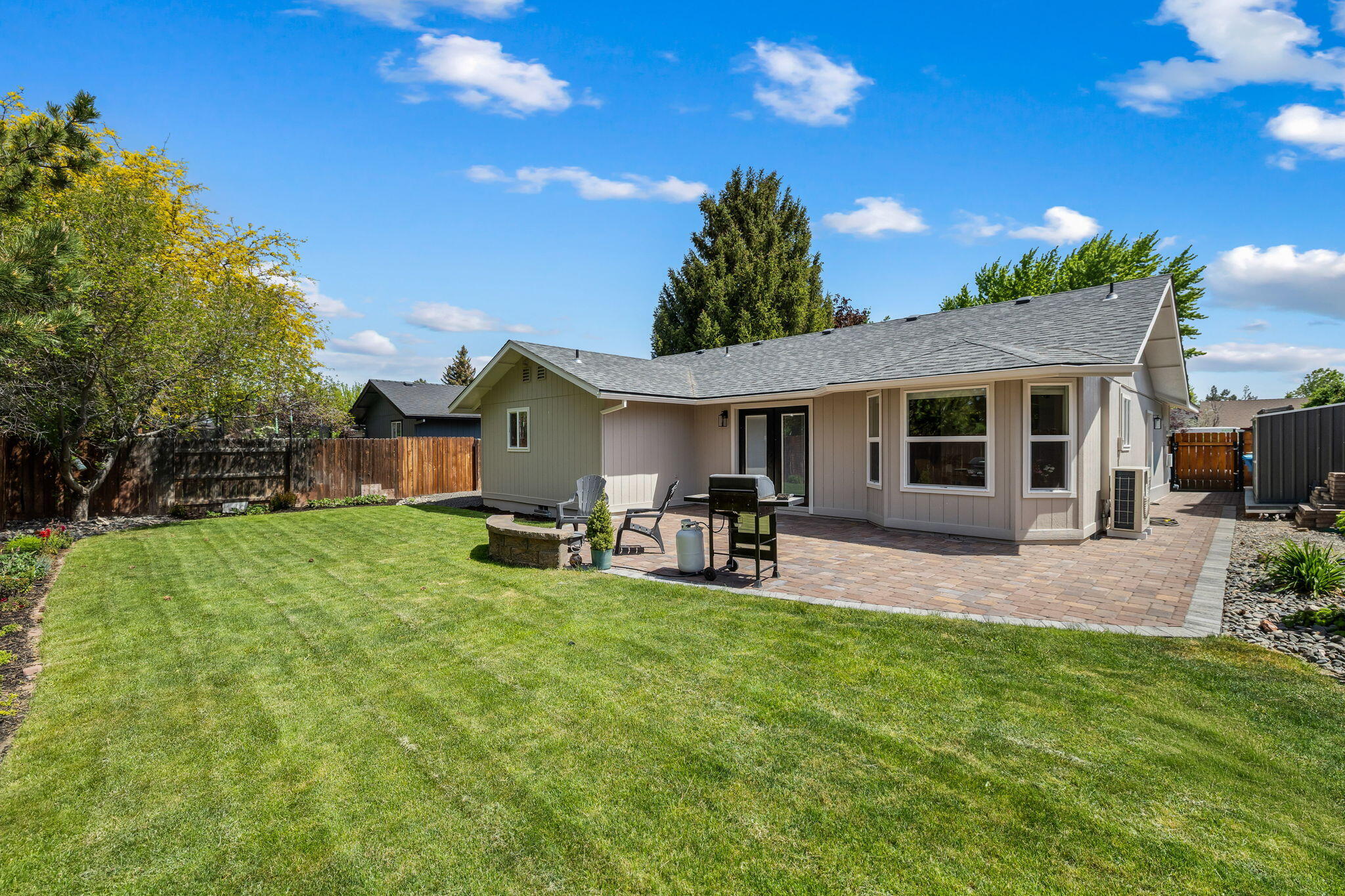 1255 Southwest 28th Street Redmond, OR 97756 - Photo 39 of 40 a front view of a house with patio and garden