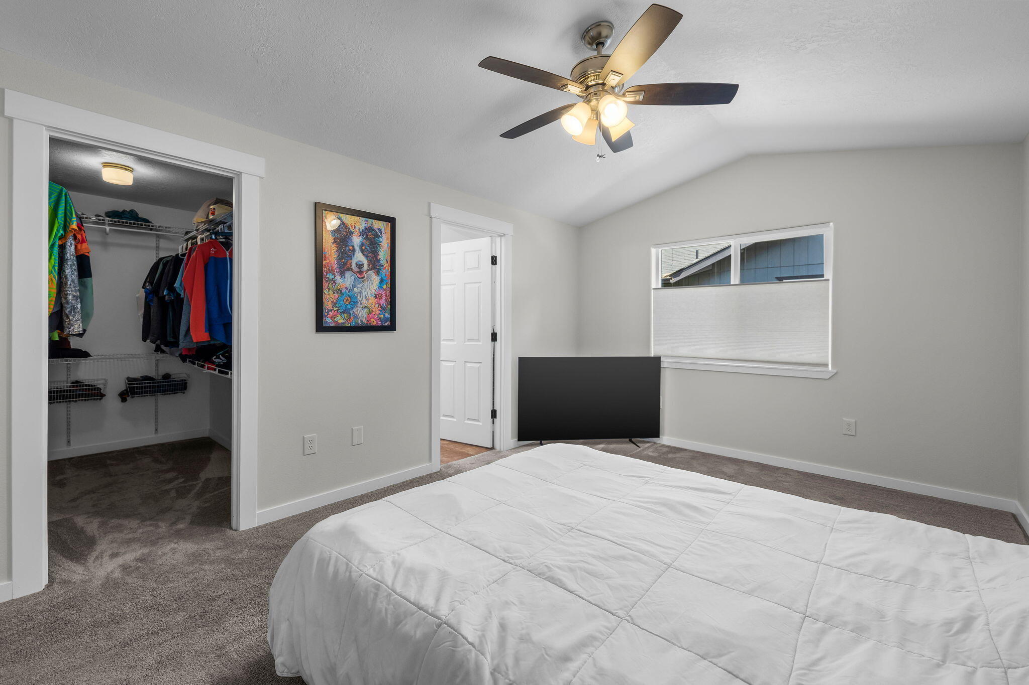 1255 Southwest 28th Street Redmond, OR 97756 - Photo 8 of 40 a view of a livingroom with a chandelier fan and closet
