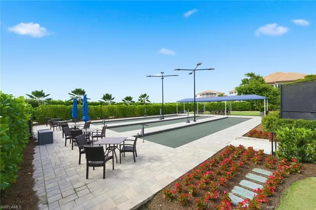 a view of a lake with a building in the background