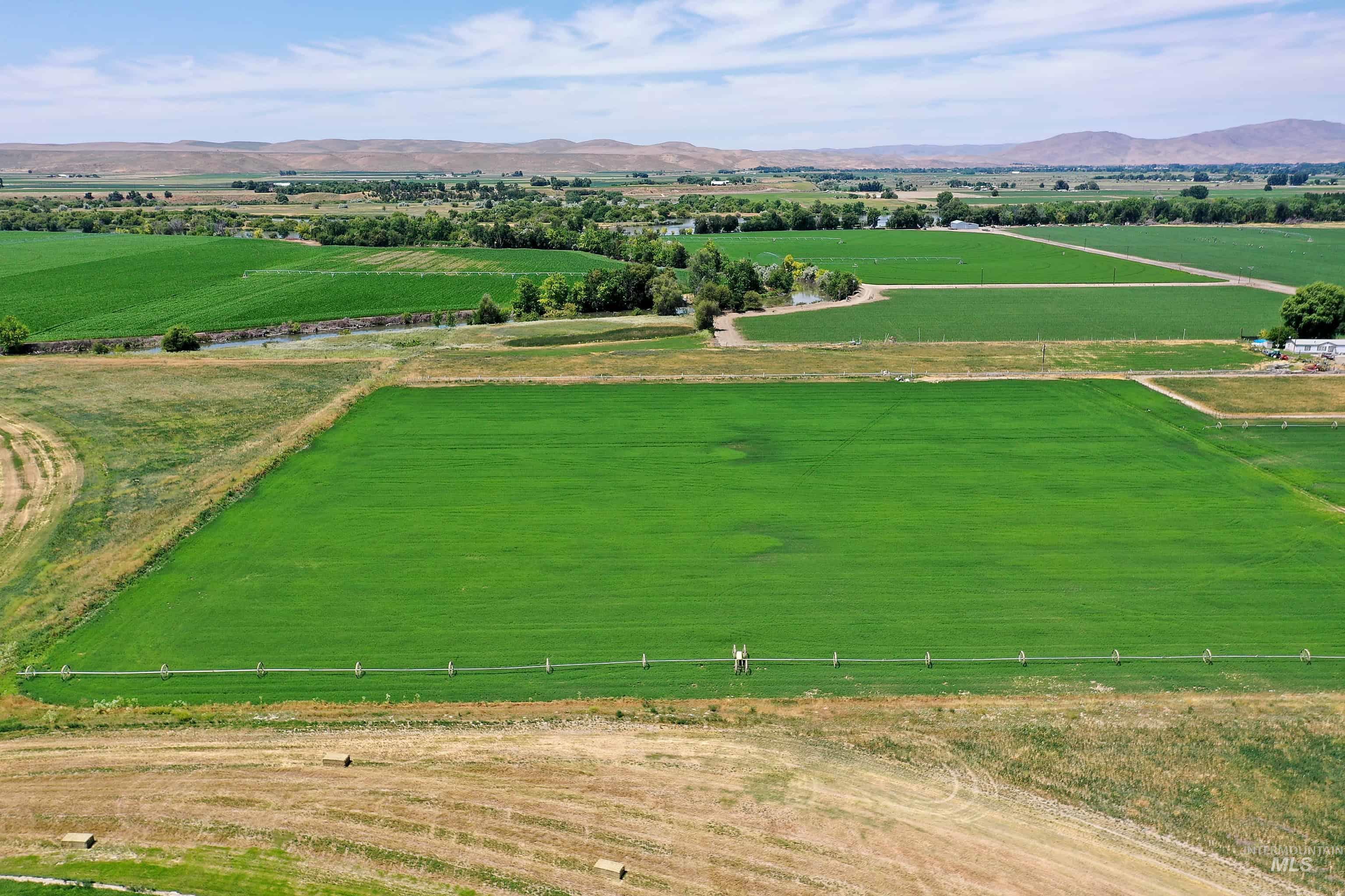 Tbd Ross Road Weiser, ID 83672 - Photo 4 of 14 View of rural area featuring abundant farmland and a mountainous background