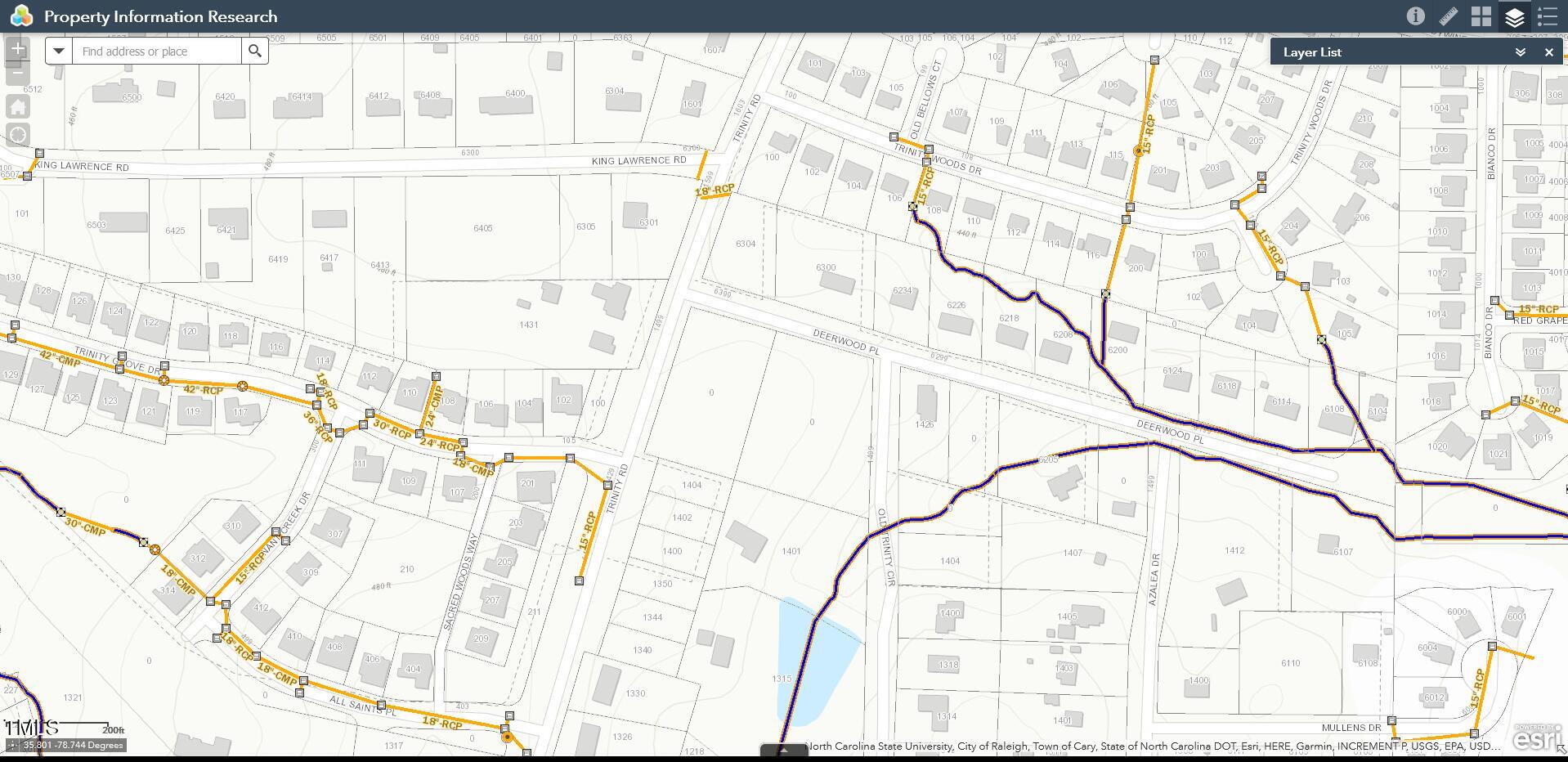 0 Trinity Road Raleigh, NC 27607 - Photo 5 of 5 a white house with a black and white door