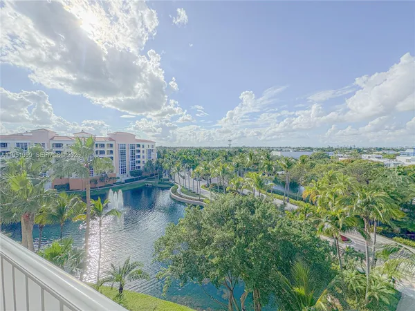 a view of a lake from a balcony