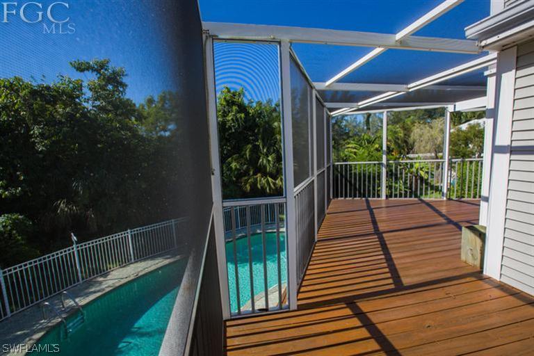 1342 Sand Castle Road Sanibel, FL 33957 - Photo 17 of 17 a view of balcony deck and patio
